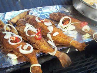 Jamaican Fry Fish with onion and other seasoning