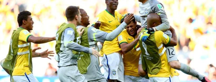 2014 FIFA World Cup - Brazil celebrate winning on penalties and advancing to the quarter-finals.