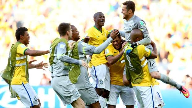 2014 FIFA World Cup - Brazil celebrate winning on penalties and advancing to the quarter-finals.