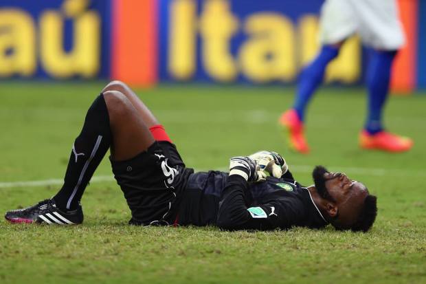 2014 FIFA World Cup - Cameroon, Australia and Spain became the first three teams to bow out of the tournament.