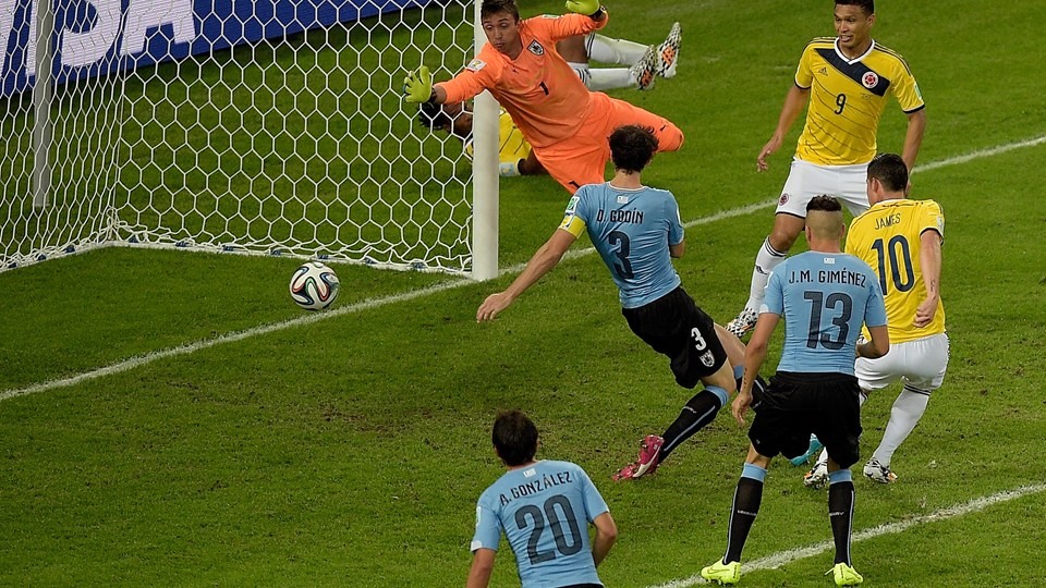 2014 FIFA World Cup - Colombia's Rodriguez scores the second goal of the match.