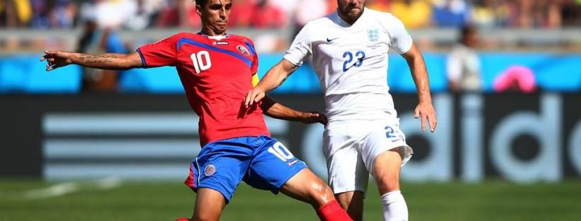 2014 FIFA World Cup - Costa Rica captain Bryan Ruiz makes a challenge on England defender Luke Shaw.