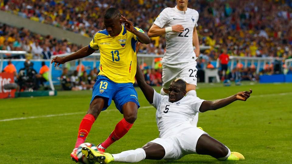 2014 FIFA World Cup - France defender Mamadou Sakho tackles Ecuador forward Enner Valencia.