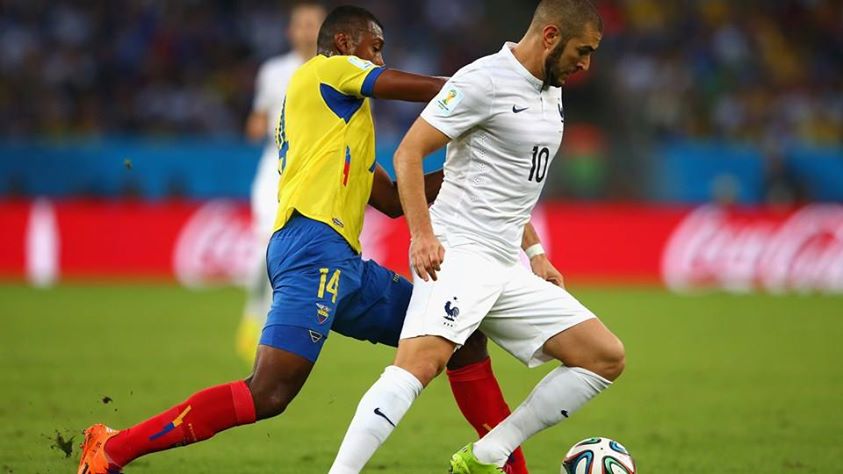 2014 FIFA World Cup - France forward Karim Benzema dribbles away from Ecuador's Oswaldo Minda.
