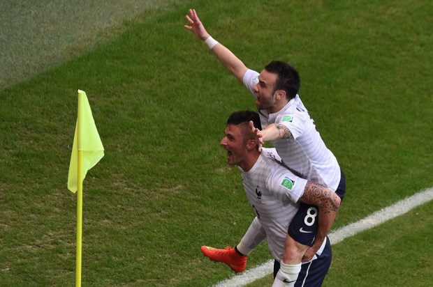 France midfielder Mathieu Valbuena celebrates with forward Olivier Giroud after scoring the third goal. - Switzerland 0-3 France