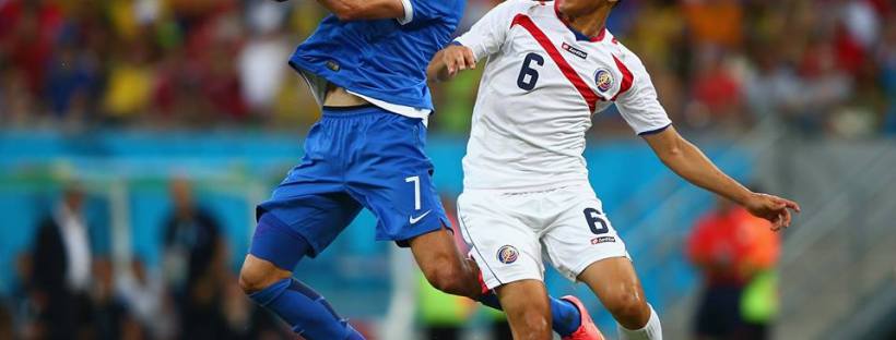 2014 FIFA World Cup - Giorgos Samaras of Greece controls the ball against Oscar Duarte of Costa Rica.