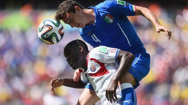 Italy defender Matteo Darmian challenges Costa Rica forward Joel Campbell for the ball - Italy 0-1 Costa Rica