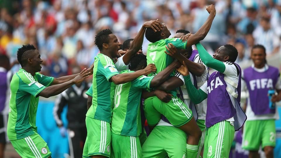 2014 FIFA World Cup - Nigeria celebrate their second goal in Porto Alegre.
