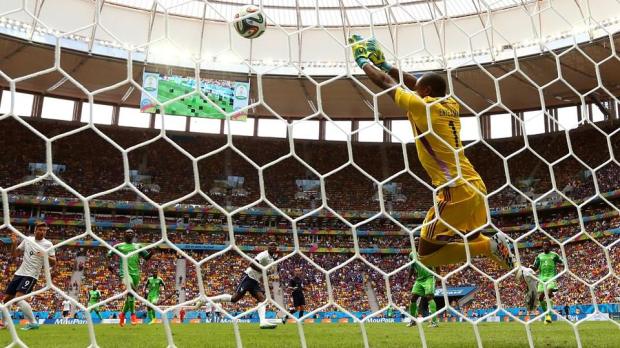 2014 FIFA World Cup - Nigeria goalkeeper Vincent Enyeama saves a shot by Paul Pogba of France.