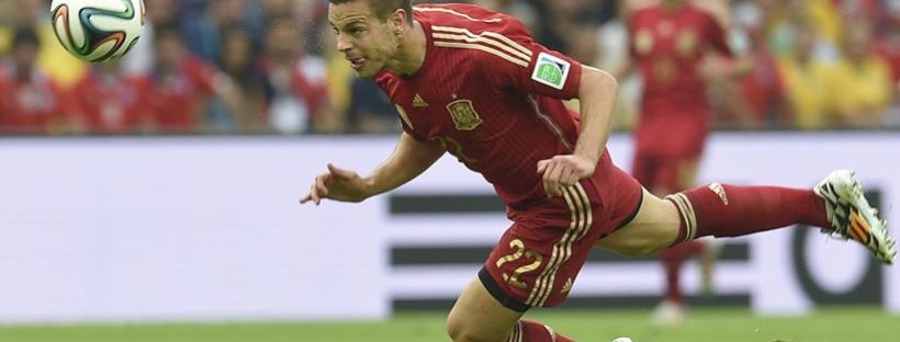 Spain defender Cesar Azpilicueta attemps a diving header in Rio de Janeiro - Spain 0 vs. 2 Chile