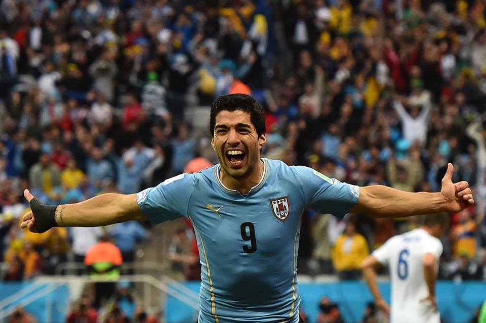 2014 FIFA World Cup - Uruguay's Suarez celebrates scoring the opener in the 39th minute.