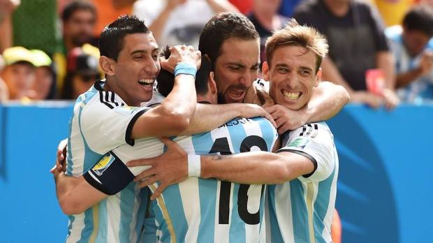 2014 Fifa World Cup - Argentina players celebrate Gonzalo Higuain's goal against Belgium