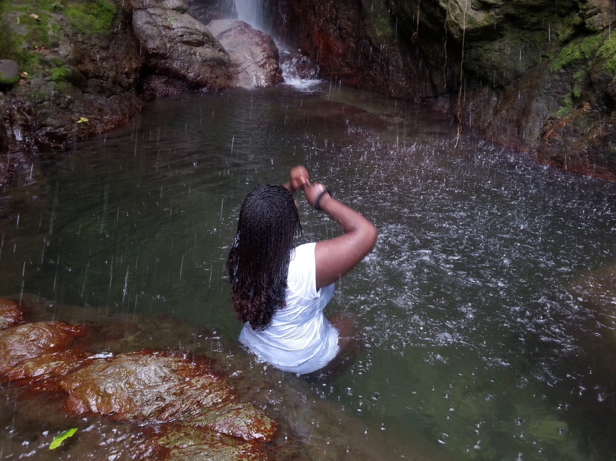 Poetess Denise Fyffe enjoying the Waterfalls at Rafjam Bed and Breakfast in Jamaica. Courtesy of Poetess Denise Fyffe
