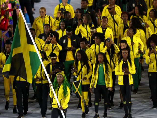 PHOTO: Flag bearer Shelly-Ann Fraser-Pryce of Jamaica leads her Olympic Team during the opening ceremony of the Rio 2016 Olympic Games at Maracana Stadium, Aug. 5, 2016 in Rio de Janeiro, Brazil.