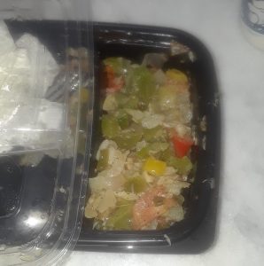 Island Quizine food filled with onions and scallion, skimp on saltfisk or ackee